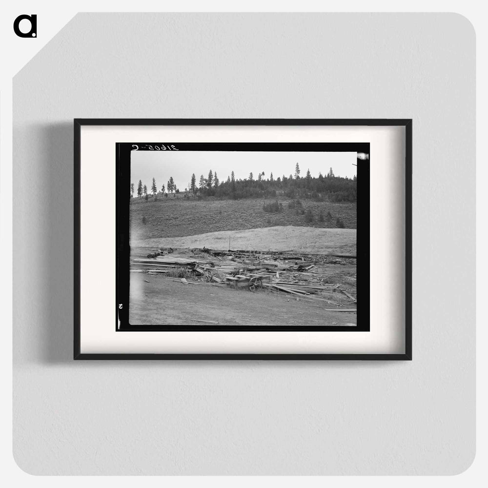 The remains of the sawmill in a deserted mill town - Dorothea Lange Poster.