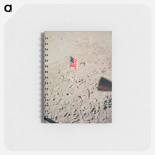 The flag of the United States and the footprints of astronauts Neil A. Armstrong and Edwin E. Aldrin Jr. - Apollo Moon Landing Memo.