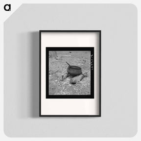 アートポスター-Iron pot for heating water stands out in the yard of tobacco farmer - ドロテア ラング Poster.