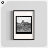 Scarecrow on a newly cleared field with stumps near Roxboro, North Carolina - Dorothea Lange Poster.