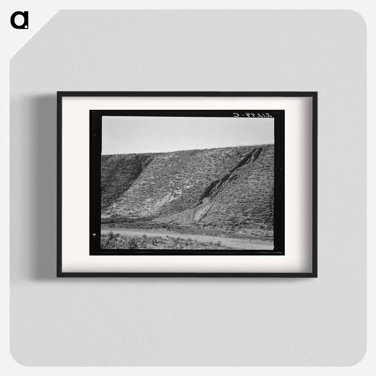 Water seepage from newly irrigated land on top of bench, eroding the sides. - Dorothea Lange Poster.