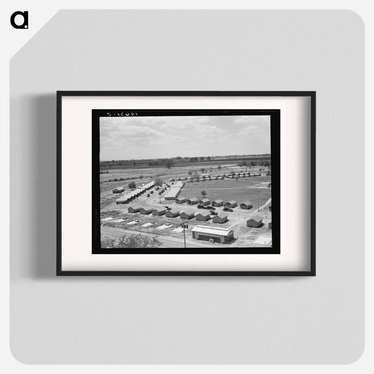 General view of one end of camp showing three units of the camp, each with its sanitary building. - Dorothea Lange Poster.