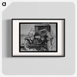 Car of drought refugees on edge of carrot field in the Coachella Valley. California - Dorothea Lange Poster.