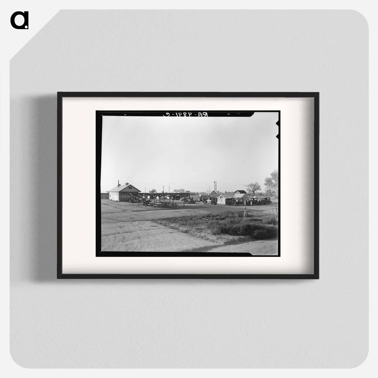 View of Kern migrant camp showing outdoor clubroom with protection from the sun - Dorothea Lange Poster.