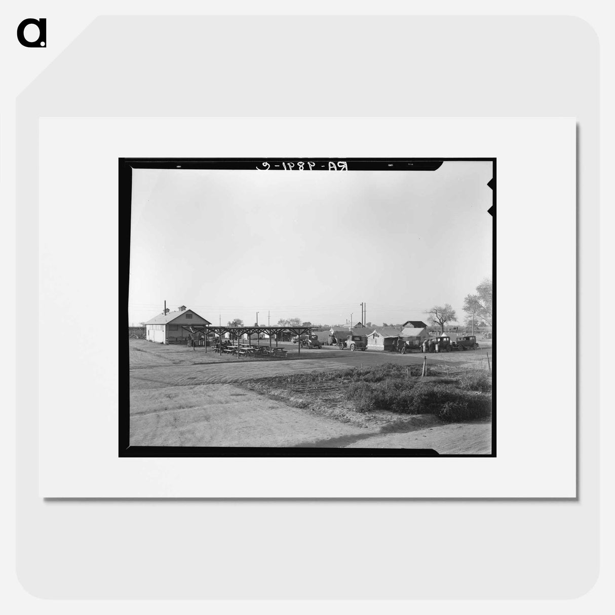 View of Kern migrant camp showing outdoor clubroom with protection from the sun - Dorothea Lange Poster.