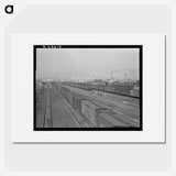 Railroad yard, outskirts of fast-growing town. Klamath Falls, Oregon. - Dorothea Lange Poster.