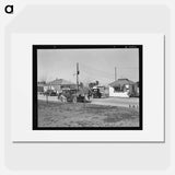 Entering Farm Security Administration camp for migratory laborers at Indio. Coachella Valley, California. - Dorothea Lange Poster.