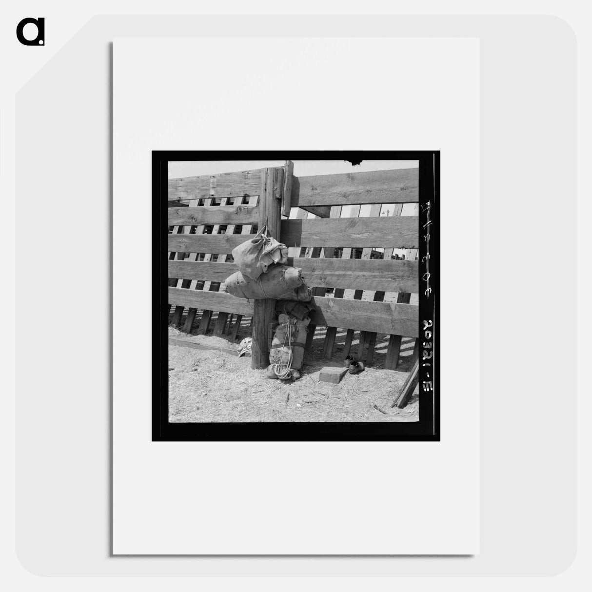 Bundles against cattle corrals by the railroad track - Dorothea Lange Poster.